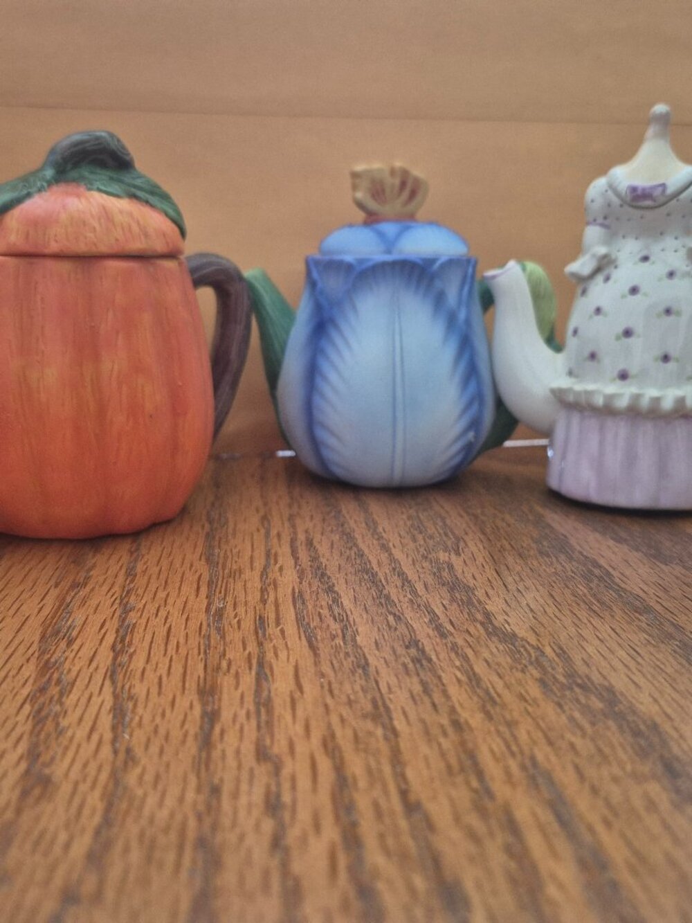 3 small decorative teapots